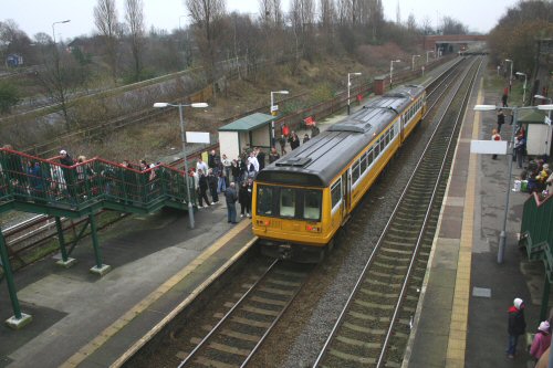 142055 brings another full load of Manchester-bound passengers at 1339